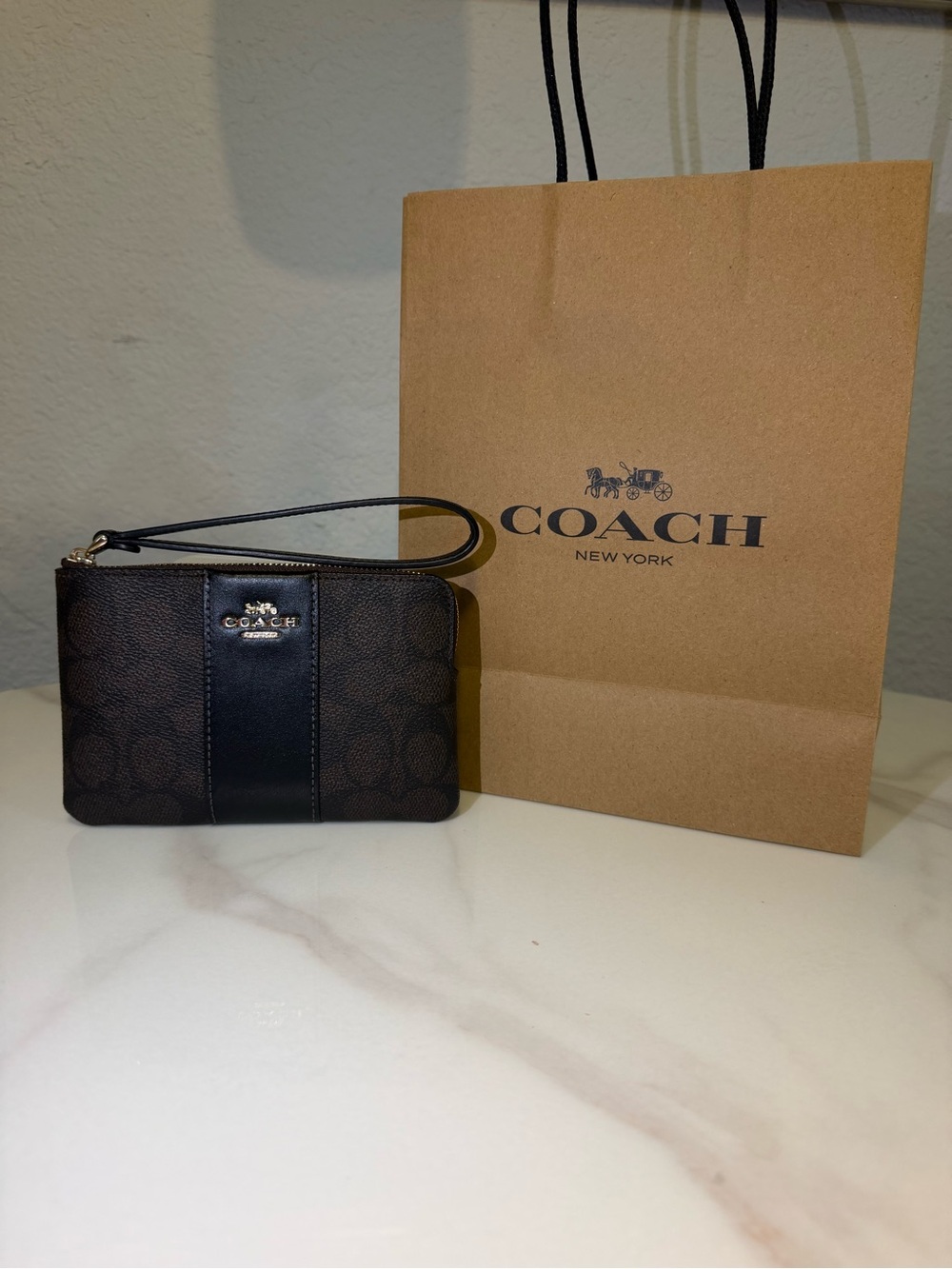Coach Men’s Signature Wristlet in Brown with Black Trim